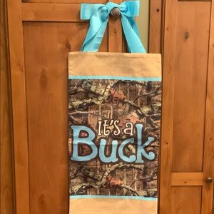 14”x29” Baby door banner Mossy Oak with blue ribbon.  Great for hospital door.